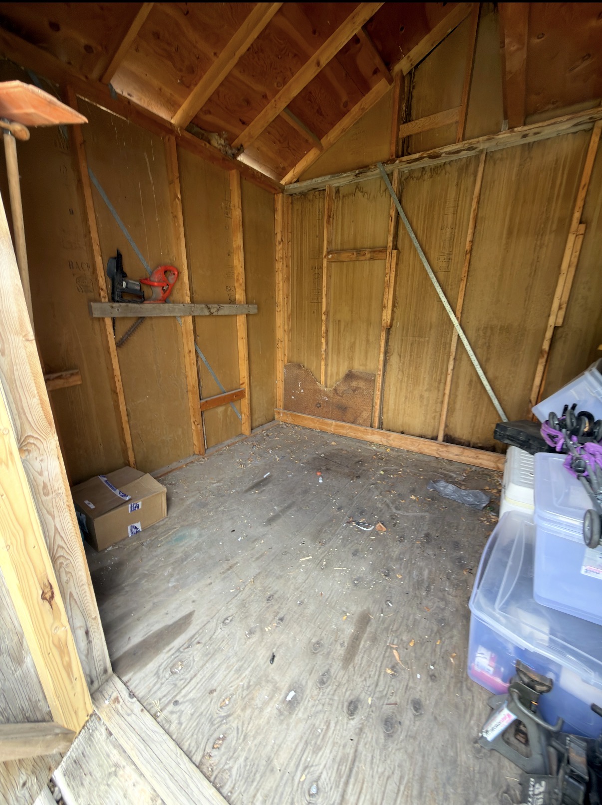 Empty, swept-out shed after junk removal by Jay's Local Junk Removal